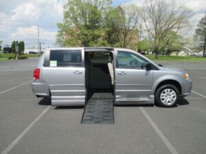 Silver Dodge Grand Caravan with BraunAbility Side Entry Automatic Fold Out conversion
