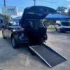 Blue Toyota Sienna with Driverge Rear Entry Manual Fold Out conversion