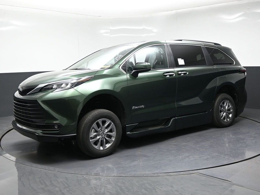 Green Toyota Sienna with BraunAbility Side Entry Automatic Fold Out conversion