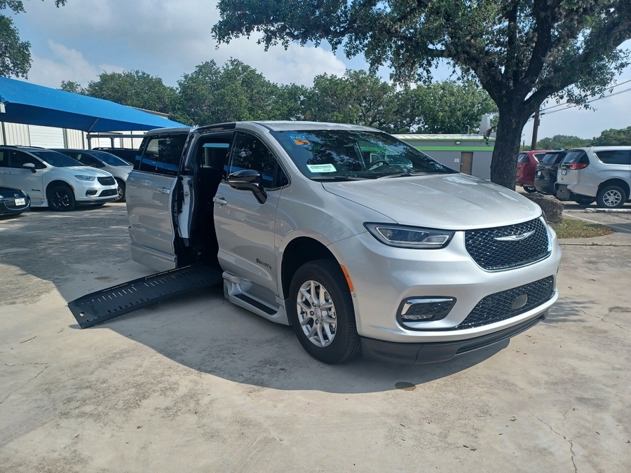 Silver Chrysler Pacifica with BraunAbility Side Entry Automatic Fold Out conversion