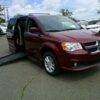 Red Dodge Grand Caravan with BraunAbility Side Entry Automatic Fold Out conversion