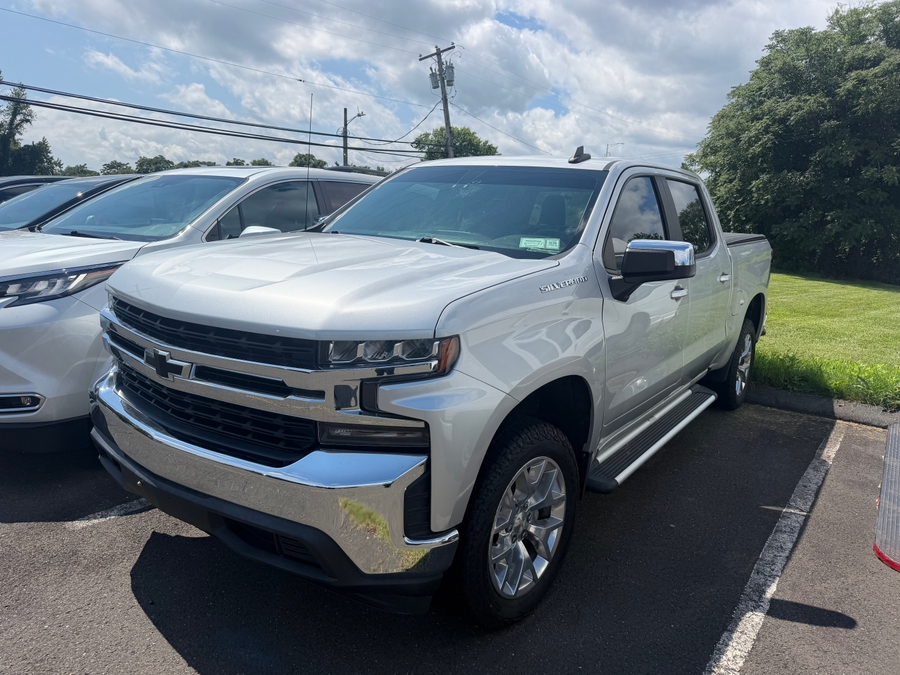 Silver Chevrolet Silverado 1500 with ATC Side Entry Automatic Fold Out conversion