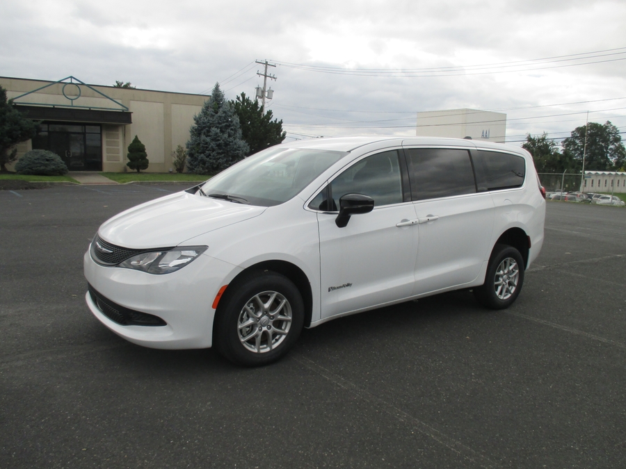 White Chrysler Voyager with BraunAbility Rear Entry Manual Fold Out conversion