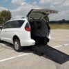 White Chrysler Voyager with BraunAbility Rear Entry Manual Fold Out conversion