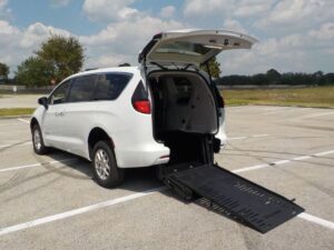 White Chrysler Voyager with BraunAbility Rear Entry Manual Fold Out conversion
