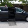 Black Chrysler Pacifica with Driverge Side Entry Automatic Fold Out conversion