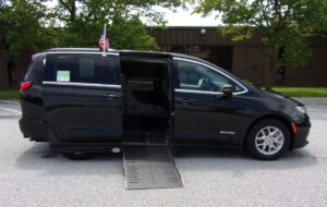 Black Chrysler Pacifica with Driverge Side Entry Automatic Fold Out conversion