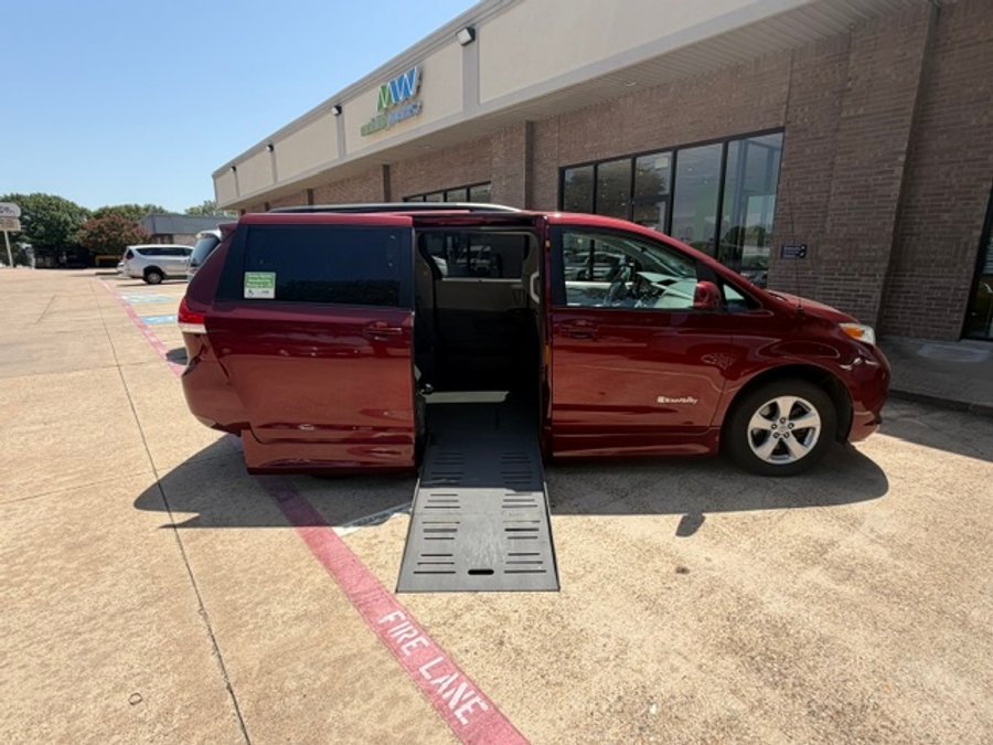 Red Toyota Sienna with BraunAbility Side Entry Automatic Fold Out conversion