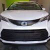 White Toyota Sienna with BraunAbility Side Entry Automatic Fold Out conversion
