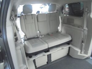 Silver Chrysler Town and Country with BraunAbility Side Entry Automatic Fold Out conversion