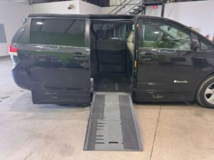 Black Toyota Sienna with BraunAbility Side Entry Automatic Fold Out conversion