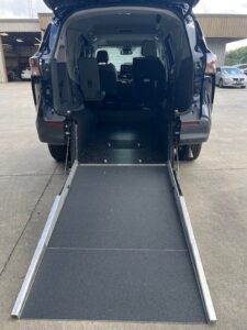 Blue Toyota Sienna with Driverge Rear Entry Manual Fold Out conversion