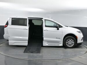 White Chrysler Pacifica with BraunAbility Side Entry Automatic Fold Out conversion