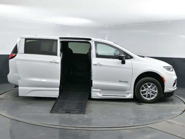 White Chrysler Pacifica with BraunAbility Side Entry Automatic Fold Out conversion