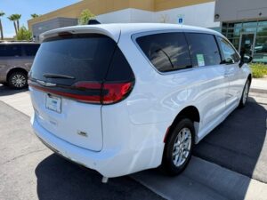 White Chrysler Pacifica with BraunAbility Side Entry Automatic Fold Out conversion