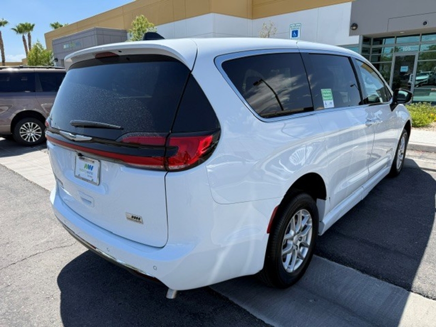 White Chrysler Pacifica with BraunAbility Side Entry Automatic Fold Out conversion