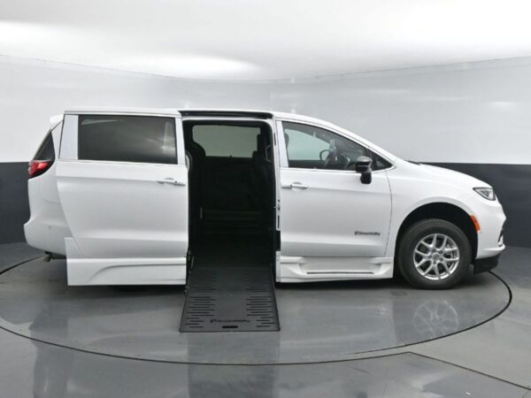 White Chrysler Pacifica with BraunAbility Side Entry Automatic Fold Out conversion