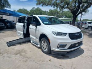 White Chrysler Pacifica with BraunAbility Side Entry Automatic Fold Out conversion