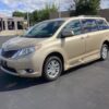 Gold Toyota Sienna with BraunAbility Side Entry Automatic Fold Out conversion