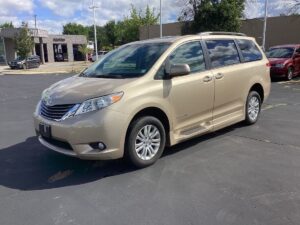 Gold Toyota Sienna with BraunAbility Side Entry Automatic Fold Out conversion