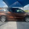 Orange Toyota Sienna with BraunAbility Side Entry Automatic Fold Out conversion