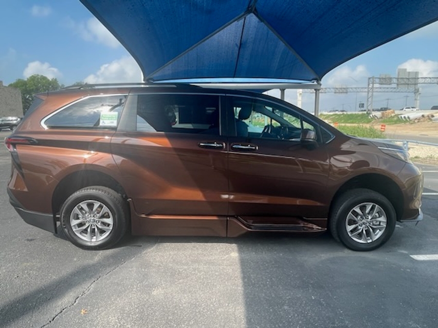 Orange Toyota Sienna with BraunAbility Side Entry Automatic Fold Out conversion