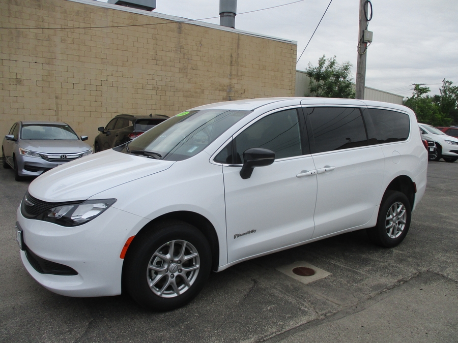 White Chrysler Voyager with BraunAbility Rear Entry Manual Fold Out conversion