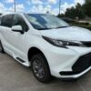 White Toyota Sienna with BraunAbility Side Entry Automatic Fold Out conversion