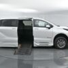 White Toyota Sienna with BraunAbility Side Entry Automatic Fold Out conversion