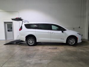 White Chrysler Voyager with BraunAbility Rear Entry Manual Fold Out conversion