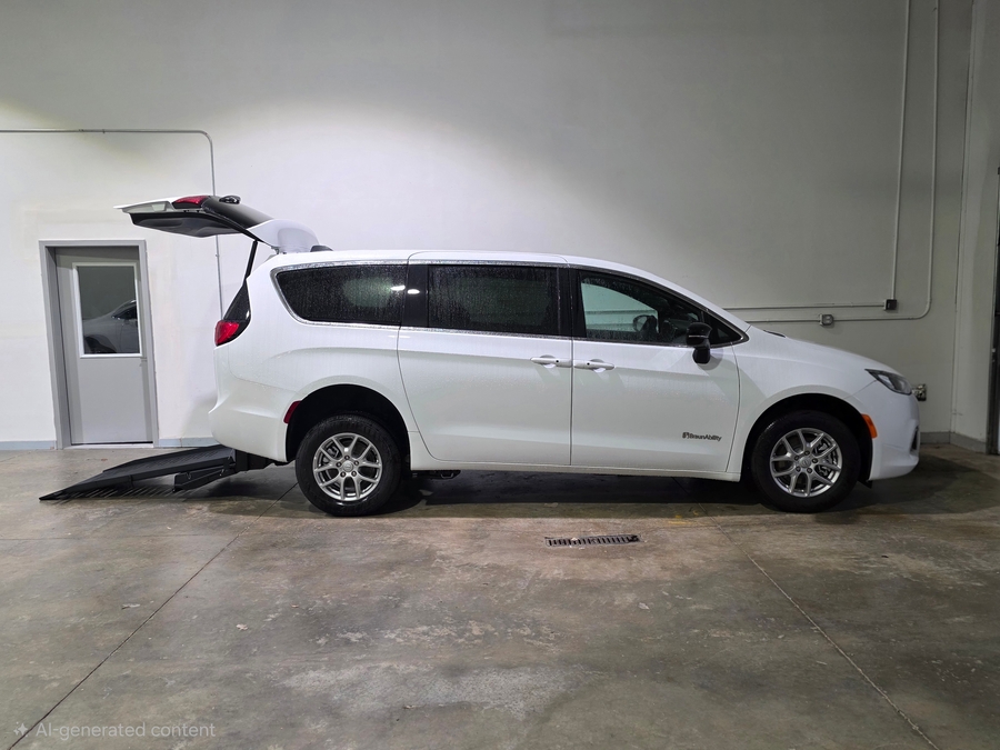 White Chrysler Voyager with BraunAbility Rear Entry Manual Fold Out conversion