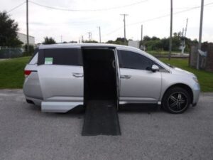 Silver Honda Odyssey with Vantage Mobility Side Entry Automatic In Floor conversion