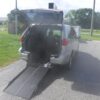 Silver Toyota Sienna with Other Rear Entry Manual Fold Out conversion