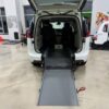 White Chrysler Pacifica with Driverge Rear Entry Manual Fold Out conversion