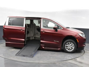 Red Chrysler Voyager with BraunAbility Side Entry Automatic In Floor conversion