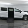 White Chrysler Voyager with BraunAbility Side Entry Manual Fold Out conversion