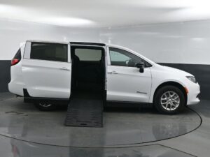 White Chrysler Voyager with BraunAbility Side Entry Manual Fold Out conversion