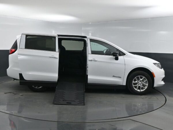 White Chrysler Voyager with BraunAbility Side Entry Manual Fold Out conversion