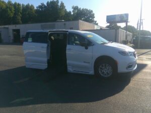 White Chrysler Pacifica with BraunAbility Side Entry Automatic Fold Out conversion