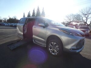 Silver Toyota Sienna with BraunAbility Side Entry Automatic Fold Out conversion