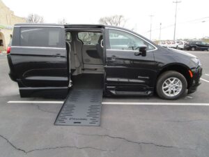 Black Chrysler Voyager with BraunAbility Side Entry Automatic Fold Out conversion