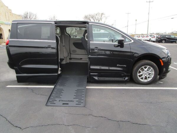 Black Chrysler Voyager with BraunAbility Side Entry Automatic Fold Out conversion