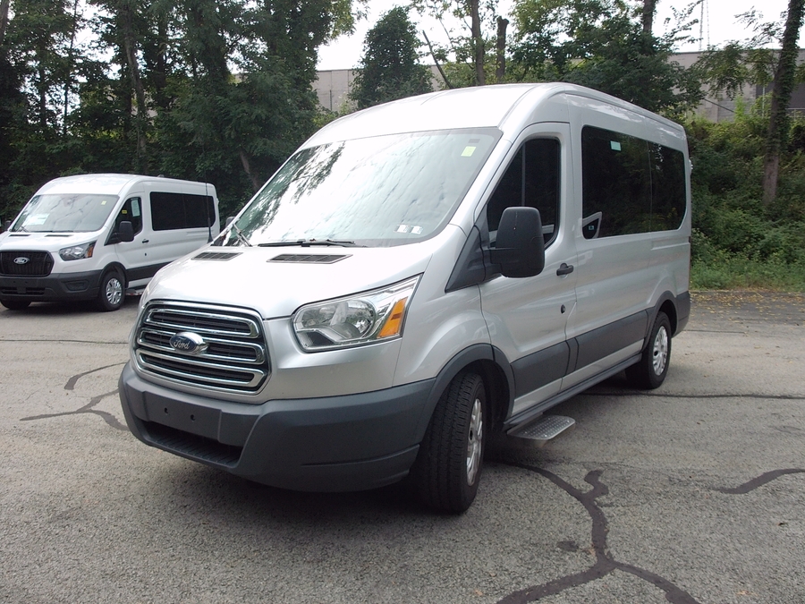 Silver Ford Transit with Driverge Side Entry Automatic Fold Out conversion