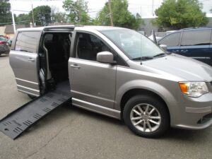 Silver Dodge Grand Caravan with BraunAbility Side Entry Manual Fold Out conversion