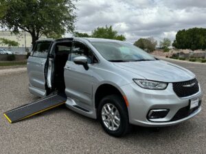Silver Chrysler Pacifica with Driverge Side Entry Automatic Fold Out conversion