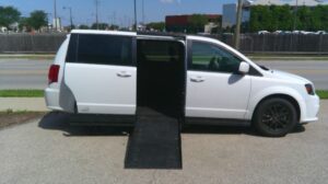 White Dodge Grand Caravan with Vantage Mobility Side Entry Automatic Fold Out conversion