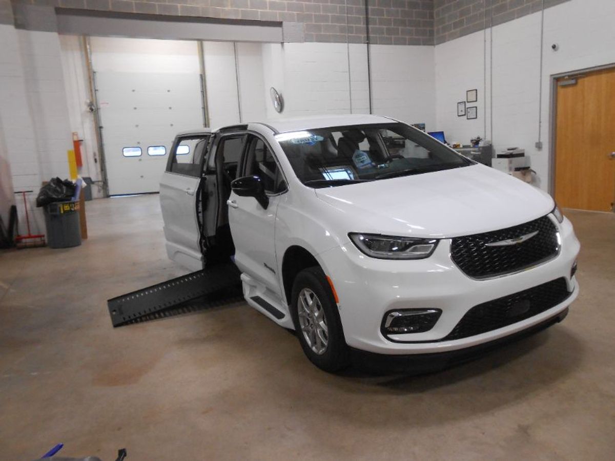 White Chrysler Pacifica with BraunAbility Side Entry Automatic In Floor conversion