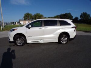 White Toyota Sienna with BraunAbility Side Entry Automatic Fold Out conversion