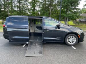 Black Chrysler Pacifica with Driverge Side Entry Automatic Fold Out conversion