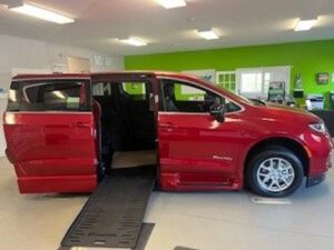 Red Chrysler Pacifica with BraunAbility Side Entry Automatic Fold Out conversion
